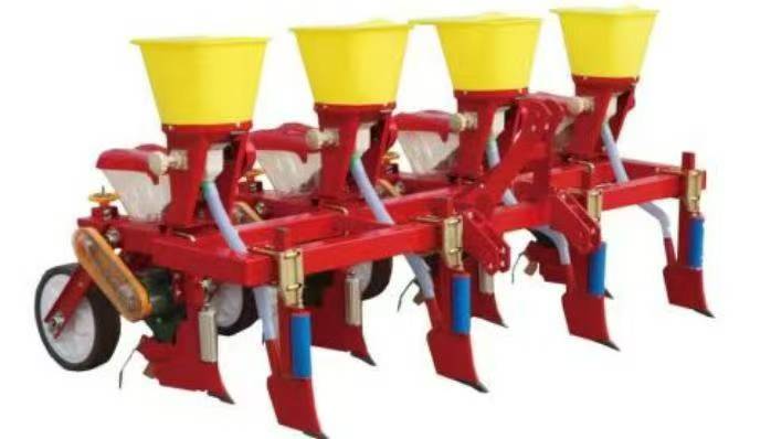 Traktormonterad majsfrön Traktormonterad majsfrön